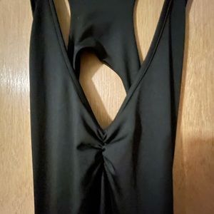 Black women’s open back dress was since Laura section